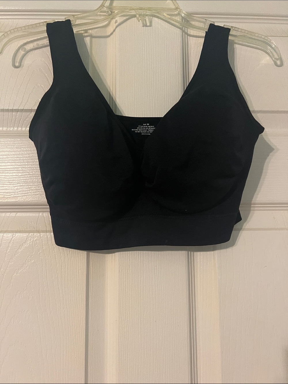 Black pullover/seamless comfort Bra. Size 3X. New/no wear. Removable pads.